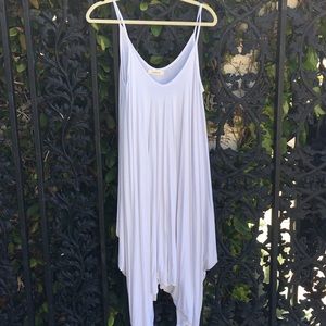 New white romper by Love In